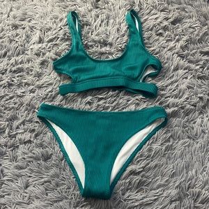 pretty green bathing suit, only worn once, full coverage, fits really nice!